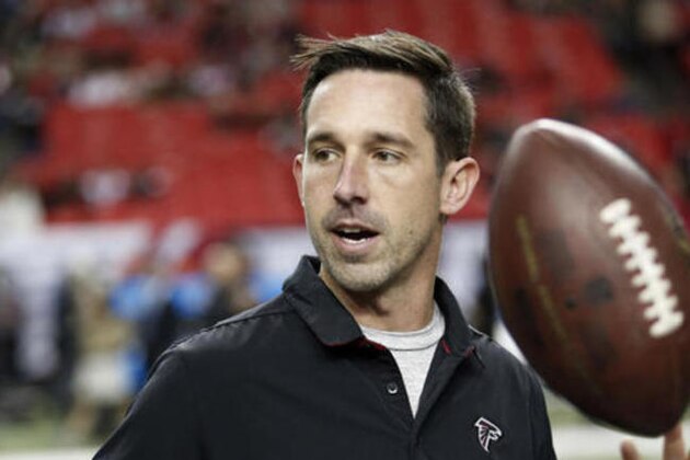 FILE - In this Dec. 18, 2016, file photo, Atlanta Falcons offensive coordinator Kyle Shanahan walks on the turf before an NFL football game against the San Francisco 49ers in Atlanta. Shanahan, expected to be one of the top targets for teams looking to replace head coaches, could be available for interviews this week. Falcons coach Dan Quinn said Monday, Jan. 2, 2017, “I'm sure he will be contacted by some teams.” (AP Photo/John Bazemore, File)