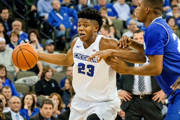 OMAHA, NEBRASKA-DECEMBER 28: Justin Patton #23 of the Creighton Bluejays drives to the basket past Rashed Anthony #25 of the Seton Hall Pirates during their game  at the CenturyLink Center on December 28, 2016 in Omaha, Nebraska. (Photo by Eric Francis/Getty Images)