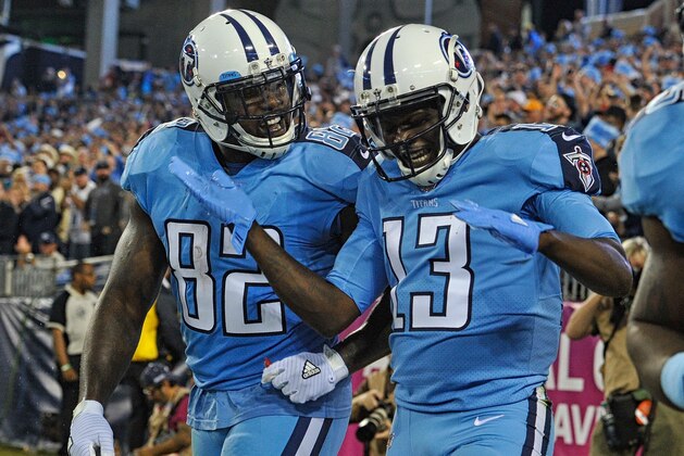NASHVILLE, TN - OCTOBER 27:  Delanie Walker #82 of the Tennessee Titans congratulates teammate Kendall Wright #13 on scoring a touchdown against the Jacksonville Jaguars during the first half at Nissan Stadium on October 27, 2016 in Nashville, Tennessee.  (Photo by Frederick Breedon/Getty Images)