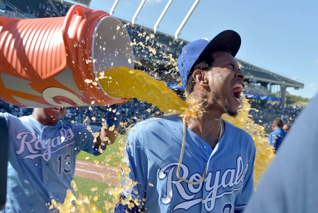 Sep 19, 2016; Kansas City, MO, USA; Kansas City Royals starting pitcher Yordano Ventura (30) reacts as he is doused by catcher Salvador Perez (13) after the win over the Chicago White Sox at Kauffman Stadium. The Royals won 8-3.  Mandatory Credit: Denny Medley-USA TODAY Sports