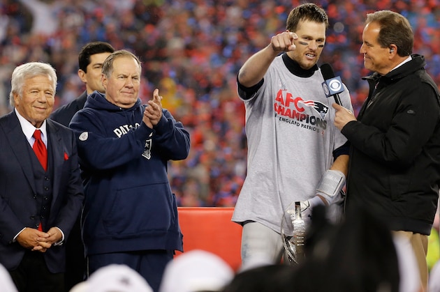 FOXBORO, MA - JANUARY 22:  Jim Nantz (R) interviews Tom Brady #12 of the New England Patriots as team owner Robert Kraft (L) and head coach Bill Belichick (2nd-L) look on after the Patriots defeated the Pittsburgh Steelers 36-17 to win the AFC Championship Game at Gillette Stadium on January 22, 2017 in Foxboro, Massachusetts.  (Photo by Jim Rogash/Getty Images)