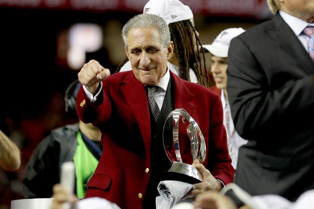 ATLANTA, GA - JANUARY 22: Atlanta Falcons owner Arthur Blank holds the George Halas trophy after defeating the Green Bay Packers in the NFC Championship Game at the Georgia Dome on January 22, 2017 in Atlanta, Georgia. The Falcons defeated the Packers 44-21. (Photo by Streeter Lecka/Getty Images)
