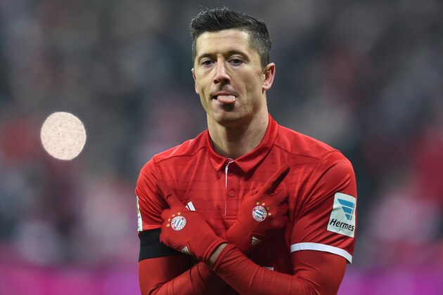 Bayern Munich's Polish striker Robert Lewandowski celebrates after the third goal for Munich during the German first division Bundesliga football match FC Bayern Munich vs RB Leipzig in Munich, Germany, on December 21, 2016. / AFP / Christof STACHE / RESTRICTIONS: DURING MATCH TIME: DFL RULES TO LIMIT THE ONLINE USAGE TO 15 PICTURES PER MATCH AND FORBID IMAGE SEQUENCES TO SIMULATE VIDEO. == RESTRICTED TO EDITORIAL USE == FOR FURTHER QUERIES PLEASE CONTACT DFL DIRECTLY AT + 49 69 650050
/ ALTERNATIVE CROP
(Photo credit should read CHRISTOF STACHE/AFP/Getty Images) Bayern Munich's Polish striker Robert Lewandowski celebrates after the third goal for Munich during the German first division Bundesliga football match FC Bayern Munich vs RB Leipzig in Munich, Germany, on December 21, 2016. / AFP / Christof STACHE / RESTRICTIONS: DURING MATCH TIME: DFL RULES TO LIMIT THE ONLINE USAGE TO 15 PICTURES PER MATCH AND FORBID IMAGE SEQUENCES TO SIMULATE VIDEO. == RESTRICTED TO EDITORIAL USE == FOR FURTHER QUERIES PLEASE CONTACT DFL DIRECTLY AT + 49 69 650050
/ ALTERNATIVE CROP
(Photo credit should read CHRISTOF STACHE/AFP/Getty Images)