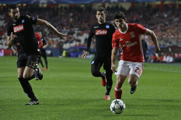 Benfica's Goncalo Guedes, right, is challenged by Napoli's Raul Albiol during the Champions League group B soccer match between Benfica and Napoli at the Luz stadium in Lisbon, Tuesday, Dec. 6, 2016. (AP Photo/Armando Franca) Benfica's Goncalo Guedes, right, is challenged by Napoli's Raul Albiol during the Champions League group B soccer match between Benfica and Napoli at the Luz stadium in Lisbon, Tuesday, Dec. 6, 2016. (AP Photo/Armando Franca)