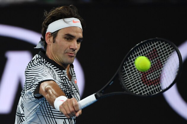 Switzerland's Roger Federer hits a return against Germany's Mischa Zverev during their men's singles quarter-final match on day nine of the Australian Open tennis tournament in Melbourne on January 24, 2017. / AFP / WILLIAM WEST / IMAGE RESTRICTED TO EDITORIAL USE - STRICTLY NO COMMERCIAL USE (Photo credit should read WILLIAM WEST/AFP/Getty Images) Switzerland's Roger Federer hits a return against Germany's Mischa Zverev during their men's singles quarter-final match on day nine of the Australian Open tennis tournament in Melbourne on January 24, 2017. / AFP / WILLIAM WEST / IMAGE RESTRICTED TO EDITORIAL USE - STRICTLY NO COMMERCIAL USE (Photo credit should read WILLIAM WEST/AFP/Getty Images)