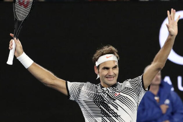 Switzerland's Roger Federer celebrates after defeating Germany's Mischa Zverev during their quarterfinal at the Australian Open tennis championships in Melbourne, Australia, Tuesday, Jan. 24, 2017. (AP Photo/Aaron Favila)