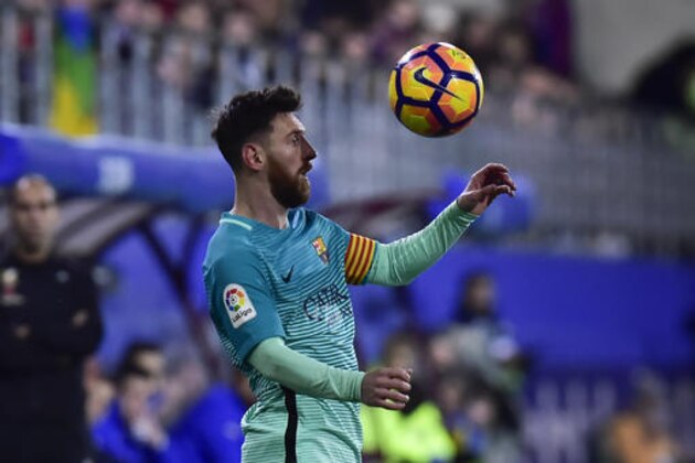 FC Barcelona's Lionel Messi controls the ball during the Spanish La Liga soccer match between FC Barcelona and Eibar, at Ipurua stadium in Eibar, northern Spain, Sunday, Jan. 22, 2017. FC Barcelona won the match 4-0. (AP Photo/Alvaro Barrientos)