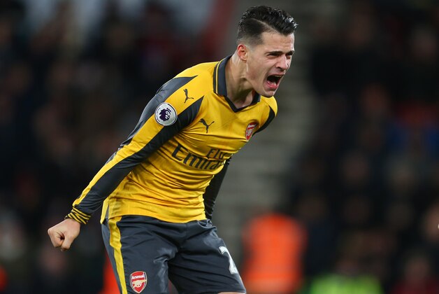 BOURNEMOUTH, ENGLAND - JANUARY 03: Granit Xhaka of Arsenal celebrates during the Premier League match between AFC Bournemouth and Arsenal at Vitality Stadium on January 3, 2017 in Bournemouth, England. (Photo by Catherine Ivill - AMA/Getty Images)