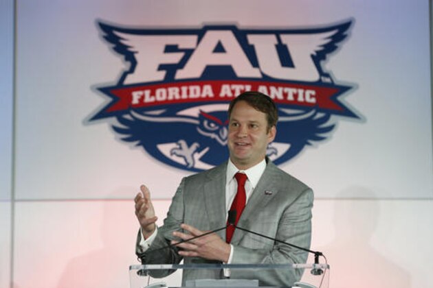 Lane Kiffin gestures as he speaks after being introduced as the new Florida Atlantic head football coach, Tuesday, Dec. 13, 2016, in Boca Raton, Fla. The school announced the move on Twitter on Tuesday, a day after Alabama coach Nick Saban said his offensive coordinator was leaving to take over the Owls. It's the fourth opportunity for Kiffin to be a head coach, after an NFL stint with the Oakland Raiders and college ones at Tennessee and USC. (AP Photo/Wilfredo Lee)