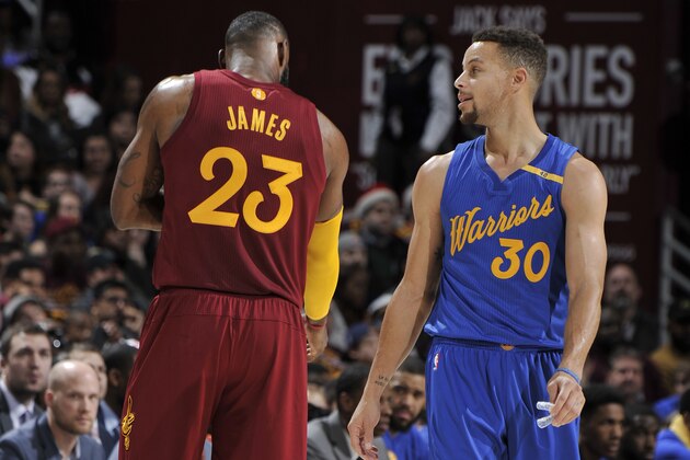 CLEVELAND, OH - DECEMBER 25:  LeBron James #23 of the Cleveland Cavaliers and Stephen Curry #30 of the Golden State Warriors on December 25, 2016 at Quicken Loans Arena in Cleveland, Ohio. NOTE TO USER: User expressly acknowledges and agrees that, by downloading and/or using this Photograph, user is consenting to the terms and conditions of the Getty Images License Agreement. Mandatory Copyright Notice: Copyright 2016 NBAE  (Photo by David Liam Kyle/NBAE via Getty Images)