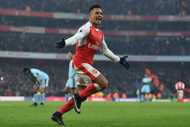 LONDON, ENGLAND - JANUARY 22:  Alexis Sanchez of Arsenal celebrates scoring his team's second goal during the Premier League match between Arsenal and Burnley at the Emirates Stadium on January 22, 2017 in London, England.  (Photo by Shaun Botterill/Getty Images)