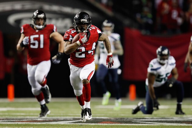 ATLANTA, GA - JANUARY 14: Devonta Freeman #24 of the Atlanta Falcons runs the ball against the Seattle Seahawks at the Georgia Dome on January 14, 2017 in Atlanta, Georgia. (Photo by Gregory Shamus/Getty Images) ATLANTA, GA - JANUARY 14: Devonta Freeman #24 of the Atlanta Falcons runs the ball against the Seattle Seahawks at the Georgia Dome on January 14, 2017 in Atlanta, Georgia. (Photo by Gregory Shamus/Getty Images)