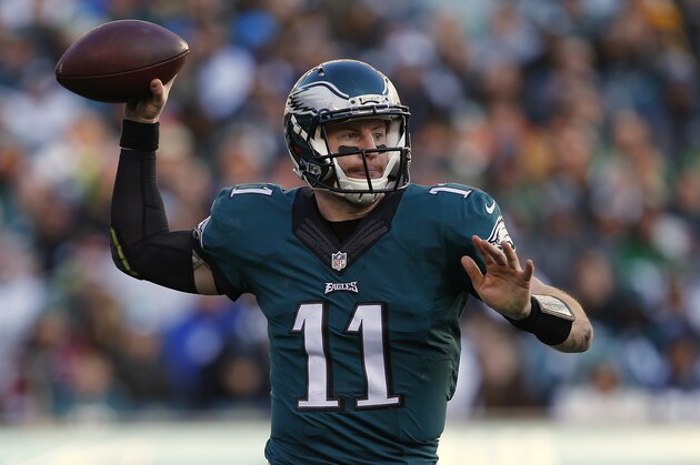 PHILADELPHIA, PA - JANUARY 01: Quarterback Carson Wentz #11 of the Philadelphia Eagles looks to pass against the Dallas Cowboys during the third quarter of a game at Lincoln Financial Field on January 1, 2017 in Philadelphia, Pennsylvania. The Eagles defatted the Cowboys 27-13. (Photo by Rich Schultz/Getty Images)