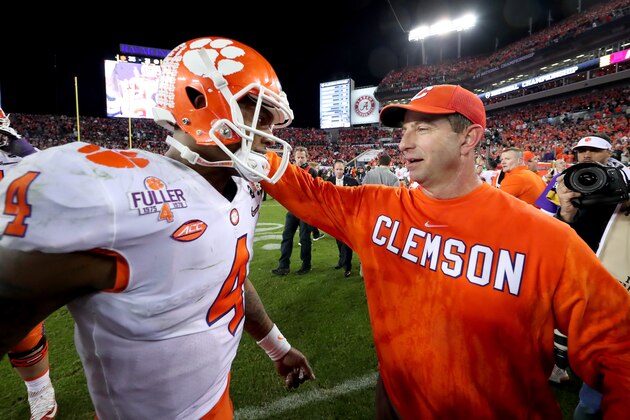 TAMPA, FL - JANUARY 09:  Quarterback Deshaun Watson #4 greets head coach Dabo Swinney of the Clemson Tigers after defeating the Alabama Crimson Tide 35-31 to win the 2017 College Football Playoff National Championship Game at Raymond James Stadium on January 9, 2017 in Tampa, Florida.  (Photo by Tom Pennington/Getty Images)