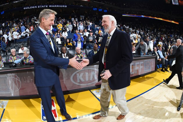 OAKLAND, CA - OCTOBER 25:  Steve Kerr of the Golden State Warriors and Gregg Popovich of the San Antonio Spurs prior to the game on October 25, 2016 at ORACLE Arena in Oakland, California. NOTE TO USER: User expressly acknowledges and agrees that, by downloading and/or using this photograph, user is consenting to the terms and conditions of the Getty Images License Agreement. Mandatory Copyright Notice: Copyright 2016 NBAE (Photo by Andrew D. Bernstein/NBAE via Getty Images)
