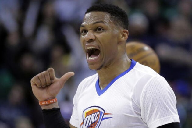 Oklahoma City Thunder guard Russell Westbrook (0) shouts to a teammate as he comes up court in the second half during an NBA basketball game against the Utah Jazz on Monday, Jan. 23, 2017, in Salt Lake City. The Thunder won 97-95. (AP Photo/Rick Bowmer)