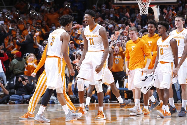 KNOXVILLE, TN - JANUARY 24: Robert Hubbs III #3 and Kyle Alexander #11 of the Tennessee Volunteers celebrate in the first half of the game against the Kentucky Wildcats at Thompson-Boling Arena on January 24, 2017 in Knoxville, Tennessee. (Photo by Joe Robbins/Getty Images)