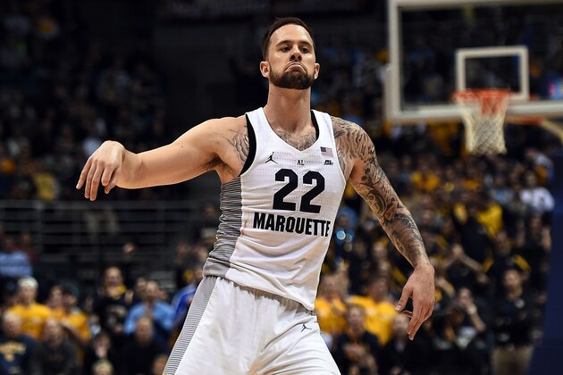 MILWAUKEE, WI - JANUARY 24:  Katin Reinhardt #22 of the Marquette Golden Eagles reacts to a three-point shot during the second half of a game against the Villanova Wildcats at BMO Harris Bradley Center on January 24, 2017 in Milwaukee, Wisconsin.  (Photo by Stacy Revere/Getty Images)