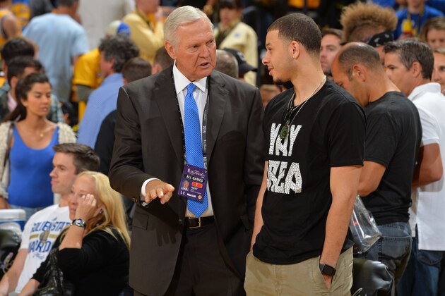OAKLAND, CA - JUNE 13:  Jerry West of the Golden State Warriors talks to Seth Curry #30 of the Sacramento Kings before Game Five of the 2016 NBA Finals between the Cleveland Cavaliers and the Golden State Warriors on June 13, 2016 at ORACLE Arena in Oakland, California. NOTE TO USER: User expressly acknowledges and agrees that, by downloading and/or using this Photograph, user is consenting to the terms and conditions of the Getty Images License Agreement. Mandatory Copyright Notice: Copyright 2016 NBAE (Photo by Jesse D. Garrabrant/NBAE via Getty Images)