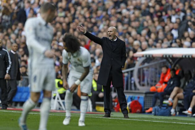 Real Madrid's head coach Zinedine Zidane gives instructions from the side line during a Spanish La Liga soccer match between Real Madrid and Malaga at the Santiago Bernabeu stadium in Madrid, Saturday, Jan. 21, 2017. (AP Photo/Francisco Seco) Real Madrid's head coach Zinedine Zidane gives instructions from the side line during a Spanish La Liga soccer match between Real Madrid and Malaga at the Santiago Bernabeu stadium in Madrid, Saturday, Jan. 21, 2017. (AP Photo/Francisco Seco)