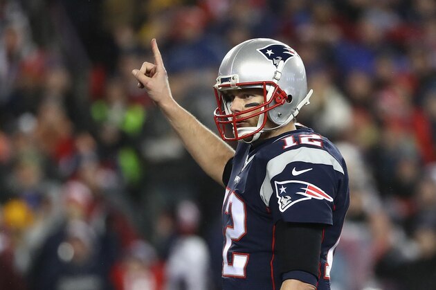 FOXBORO, MA - JANUARY 22:  Tom Brady #12 of the New England Patriots reacts against the Pittsburgh Steelers in the AFC Championship Game at Gillette Stadium on January 22, 2017 in Foxboro, Massachusetts.  (Photo by Elsa/Getty Images)