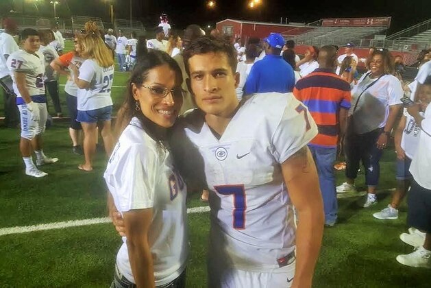 Cal running back commit Biaggio Ali Walsh, here with his mother, Rasheda, is the grandson of boxing legend Muhammad Ali. Rather than pursue a career in boxing, Ali Walsh is choosing to honor his grandfather with his play on the football field.