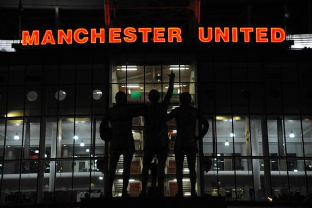 A general view of the outside of the main entrance to Old Trafford home of Manchester United ahead of the English League Cup, Semi Final First Leg, match between Manchester United and Hull City at Old Trafford in Manchester, England, Tuesday Jan. 10, 2017. (AP Photo/Rui Vieira)