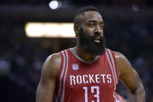 Houston Rockets guard James Harden (13) stands on the court between plays in the second half of an NBA basketball game against the Memphis Grizzlies Saturday, Jan. 21, 2017, in Memphis, Tenn. (AP Photo/Brandon Dill)