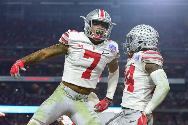 GLENDALE, AZ - DECEMBER 31:  Damon Webb #7 of the Ohio State Buckeyes and Malik Hooker #24 react during the first half of the 2016 PlayStation Fiesta Bowl against the Clemson Tigers at University of Phoenix Stadium on December 31, 2016 in Glendale, Arizona.  (Photo by Jennifer Stewart/Getty Images)