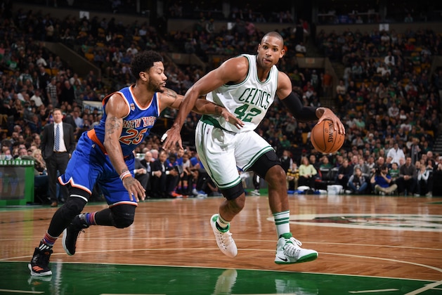 BOSTON, MA - JANUARY 18:  Al Horford #42 of the Boston Celtics handles the ball against Derrick Rose #25 of the New York Knicks during a game on January 18, 2017 at TD Garden in Boston, Massachusetts. NOTE TO USER: User expressly acknowledges and agrees that, by downloading and/or using this photograph, user is consenting to the terms and conditions of the Getty Images License Agreement. Mandatory Copyright Notice: Copyright 2017 NBAE (Photo by Brian Babineau/NBAE via Getty Images)