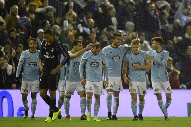 Celta Vigo's Danish midfielder Daniel Wass (2ndR) is congratulated by teammates after scoring during the Spanish Copa del Rey (King's Cup) quarter final second leg football match RC Celta de Vigo vs Real Madrid CF RC Celta de Vigo on January 25, 2017. / AFP / MIGUEL RIOPA        (Photo credit should read MIGUEL RIOPA/AFP/Getty Images)
