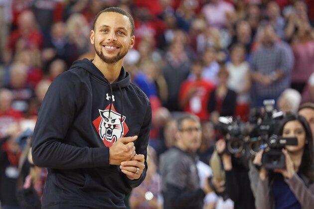 DAVIDSON, NC - JANUARY 24:  Stephen Curry #30 of the Golden State Warriors smiles on the court during the ceremony to name the student section after him at Davidson's John M. Belk Area after him at Davidson College on January 24, 2017 in Davidson, North Carolina. NOTE TO USER: User expressly acknowledges and agrees that, by downloading and or using this photograph, User is consenting to the terms and conditions of the Getty Images License Agreement. Mandatory Copyright Notice: Copyright 2017 NBAE (Photo by Kent Smith/NBAE via Getty Images)