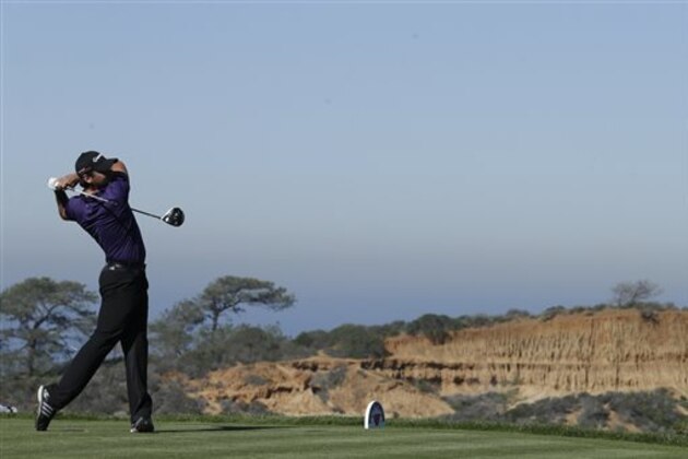 Jason Day, of Australia, hits his tee shot on the 13th hole of the North Course at Torrey Pines during the second round of the Farmers Insurance Open golf tournament Friday, Feb. 6, 2015, in San Diego. (AP Photo/Gregory Bull) Jason Day, of Australia, hits his tee shot on the 13th hole of the North Course at Torrey Pines during the second round of the Farmers Insurance Open golf tournament Friday, Feb. 6, 2015, in San Diego. (AP Photo/Gregory Bull)