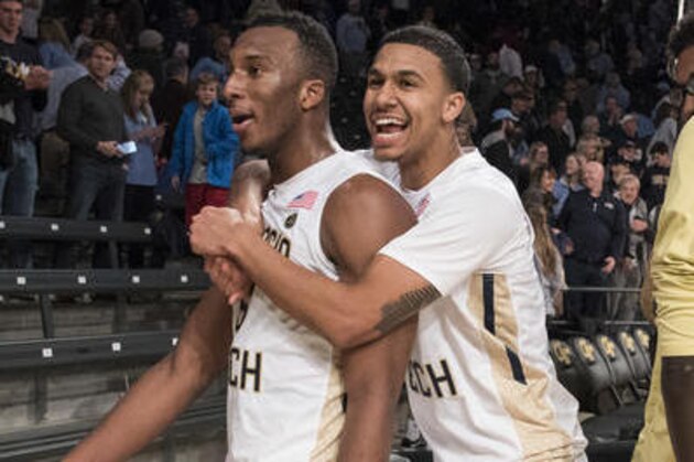 Georgia Tech guards Josh Okogie, left, and Justin Moore celebrate as they leave the court after an NCAA college basketball game against North Carolina, Saturday, Dec 31, 2016, in Atlanta. Georgia Tech won 75-63. (AP Photo/John Amis) Georgia Tech guards Josh Okogie, left, and Justin Moore celebrate as they leave the court after an NCAA college basketball game against North Carolina, Saturday, Dec 31, 2016, in Atlanta. Georgia Tech won 75-63. (AP Photo/John Amis)