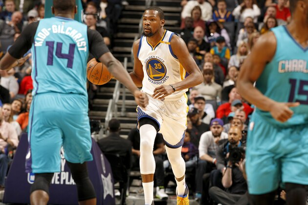 CHARLOTTE, NC - JANUARY 25:  Kevin Durant #35 of the Golden State Warriors handles the ball against the Charlotte Hornets on January 25, 2017 at Spectrum Center in Charlotte, North Carolina. NOTE TO USER: User expressly acknowledges and agrees that, by downloading and or using this photograph, User is consenting to the terms and conditions of the Getty Images License Agreement.  Mandatory Copyright Notice:  Copyright 2017 NBAE (Photo by Kent Smith/NBAE via Getty Images)