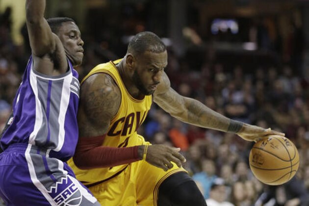Cleveland Cavaliers' LeBron James, right, drives against Sacramento Kings' Darren Collison during the second half of an NBA basketball game, Wednesday, Jan. 25, 2017, in Cleveland. The Kings won 116-112 in overtime. (AP Photo/Tony Dejak) Cleveland Cavaliers' LeBron James, right, drives against Sacramento Kings' Darren Collison during the second half of an NBA basketball game, Wednesday, Jan. 25, 2017, in Cleveland. The Kings won 116-112 in overtime. (AP Photo/Tony Dejak)