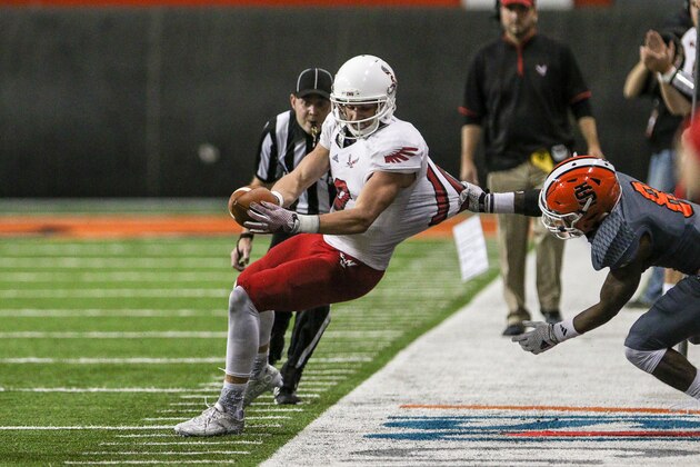 POCATELLO, ID - OCTOBER 17: Defensive back Erik Collins #8 of the Idaho State Bengals drags wide receiver Cooper Kupp #10 of the Eastern Washington Eagles out of bounds by his shirt during first half action on October 17, 2015 at Holt Arena in Pocatello, Idaho. (Photo by Loren Orr/Getty Images)