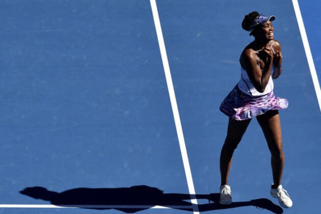 United States' Venus Williams celebrates after defeating compatriot Coco Vandeweghe during their semifinal at the Australian Open tennis championships in Melbourne, Australia, Thursday, Jan. 26, 2017. (AP Photo/Andy Brownbill)