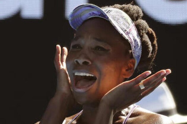 United States' Venus Williams celebrates after defeating compatriot Coco Vandeweghe during their semifinal at the Australian Open tennis championships in Melbourne, Australia, Thursday, Jan. 26, 2017. (AP Photo/Aaron Favila)