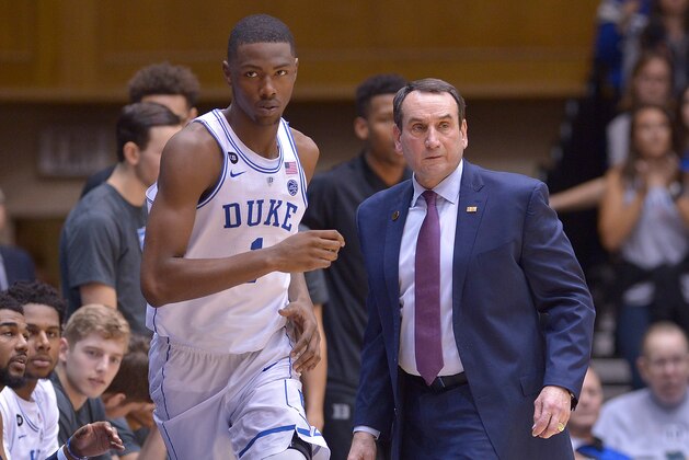 DURHAM, NC - JANUARY 04:  Head coach Mike Krzyzewski sends Harry Giles #1 of the Duke Blue Devils into the game against the Georgia Tech Yellow Jackets during the game at Cameron Indoor Stadium on January 4, 2017 in Durham, North Carolina. Duke won 110-57.  (Photo by Grant Halverson/Getty Images)