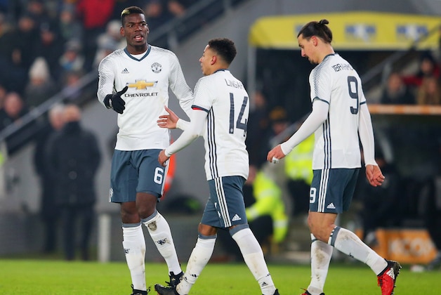 HULL, ENGLAND - JANUARY 26: Paul Pogba of Manchester United (6) celebrates with Jesse Lingard (14) as he scores their first goal during the EFL Cup Semi-Final second leg match between Hull City and Manchester United at KCOM Stadium on January 26, 2017 in Hull, England. (Photo by Alex Livesey/Getty Images) HULL, ENGLAND - JANUARY 26: Paul Pogba of Manchester United (6) celebrates with Jesse Lingard (14) as he scores their first goal during the EFL Cup Semi-Final second leg match between Hull City and Manchester United at KCOM Stadium on January 26, 2017 in Hull, England. (Photo by Alex Livesey/Getty Images)