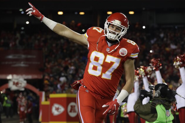 KANSAS CITY, MO - DECEMBER 8: Tight end Travis Kelce #87 of the Kansas City Chiefs enters the field during player introductions before the game against the Oakland Raiders at Arrowhead Stadium on December 8, 2016 in Kansas City, Missouri. (Photo by Jamie Squire/Getty Images)