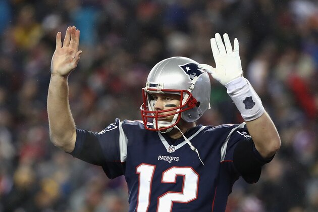 FOXBORO, MA - JANUARY 22:  Tom Brady #12 of the New England Patriots reacts against the Pittsburgh Steelers in the AFC Championship Game at Gillette Stadium on January 22, 2017 in Foxboro, Massachusetts.  (Photo by Elsa/Getty Images)