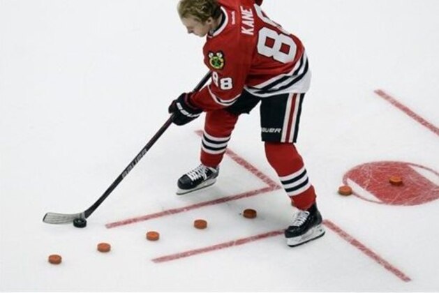 Chicago Blackhawks forward Patrick Kane (88) takes part in the challenge relay competition at the NHL All-Star skills competition Saturday, Jan. 30, 2016, in Nashville, Tenn. (AP Photo/Mark Zaleski)