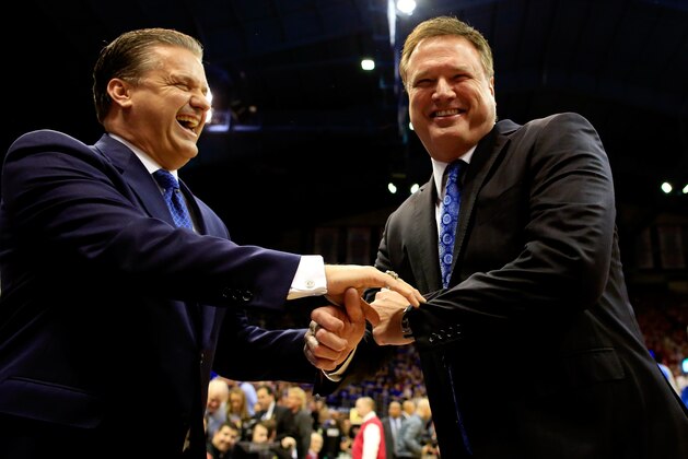 LAWRENCE, KS - JANUARY 30:  Head coach John Calipari of the Kentucky Wildcats and head coach Bill Self of the Kansas Jayhawks greet each other prior to the game at Allen Fieldhouse on January 30, 2016 in Lawrence, Kansas.  (Photo by Jamie Squire/Getty Images)