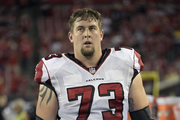 FILE - IN this Nov. 3, 2016, file photo, Atlanta Falcons offensive tackle Ryan Schraeder (73) watches from the sideline before an NFL football game against the Tampa Bay Buccaneers, in Tampa, Fla. The Falcons have signed right tackle Ryan Schraeder to a five-year contract extension. The team announced the move on Monday, Nov. 21, 2016, but did not release any financial deals of the extension. (AP Photo/Phelan M. Ebenhack, File)