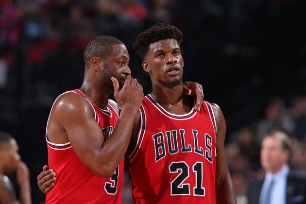PORTLAND, OR - NOVEMBER 15: Dwyane Wade #3 and Jimmy Butler #21 of the Chicago Bulls talk during the game against the Portland Trail Blazers  on November 15, 2016 at the Moda Center Arena in Portland, Oregon. NOTE TO USER: User expressly acknowledges and agrees that, by downloading and or using this photograph, user is consenting to the terms and conditions of the Getty Images License Agreement. Mandatory Copyright Notice: Copyright 2016 NBAE (Photo by Sam Forencich/NBAE via Getty Images)