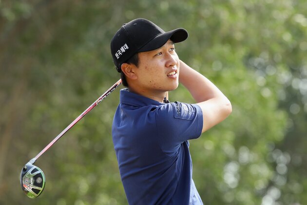 DOHA, QATAR - JANUARY 28:  Jeunghun Wang of Korea hits his tee-shot on the seventh hole during the third round of the Commercial Bank Qatar Masters at Doha Golf Club on January 28, 2017 in Doha, Qatar.  (Photo by Andrew Redington/Getty Images)