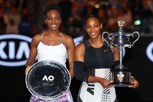 MELBOURNE, AUSTRALIA - JANUARY 28:  Serena Williams poses with the Daphne Akhurst Trophy after winning the Women's Singles Final against Venus Williams of the United States, posing with the runners up trophy on day 13 of the 2017 Australian Open at Melbourne Park on January 28, 2017 in Melbourne, Australia.  (Photo by Scott Barbour/Getty Images)