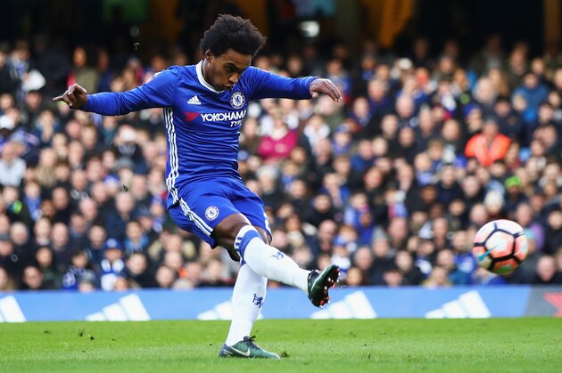 LONDON, ENGLAND - JANUARY 28:  Willian of Chelsea scores his sides first goal during the Emirates FA Cup Fourth Round match between Chelsea and Brentford at Stamford Bridge on January 28, 2017 in London, England.  (Photo by Clive Mason/Getty Images)